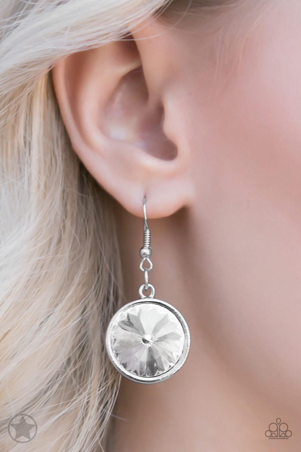 Paparazzi Accessories Hypnotized - Silver Three dramatically oversized rhinestones are nestled into three textured silver fittings that are connected by oval silver rings, creating a brilliant statement piece. Features an adjustable clasp closure. Jewelry