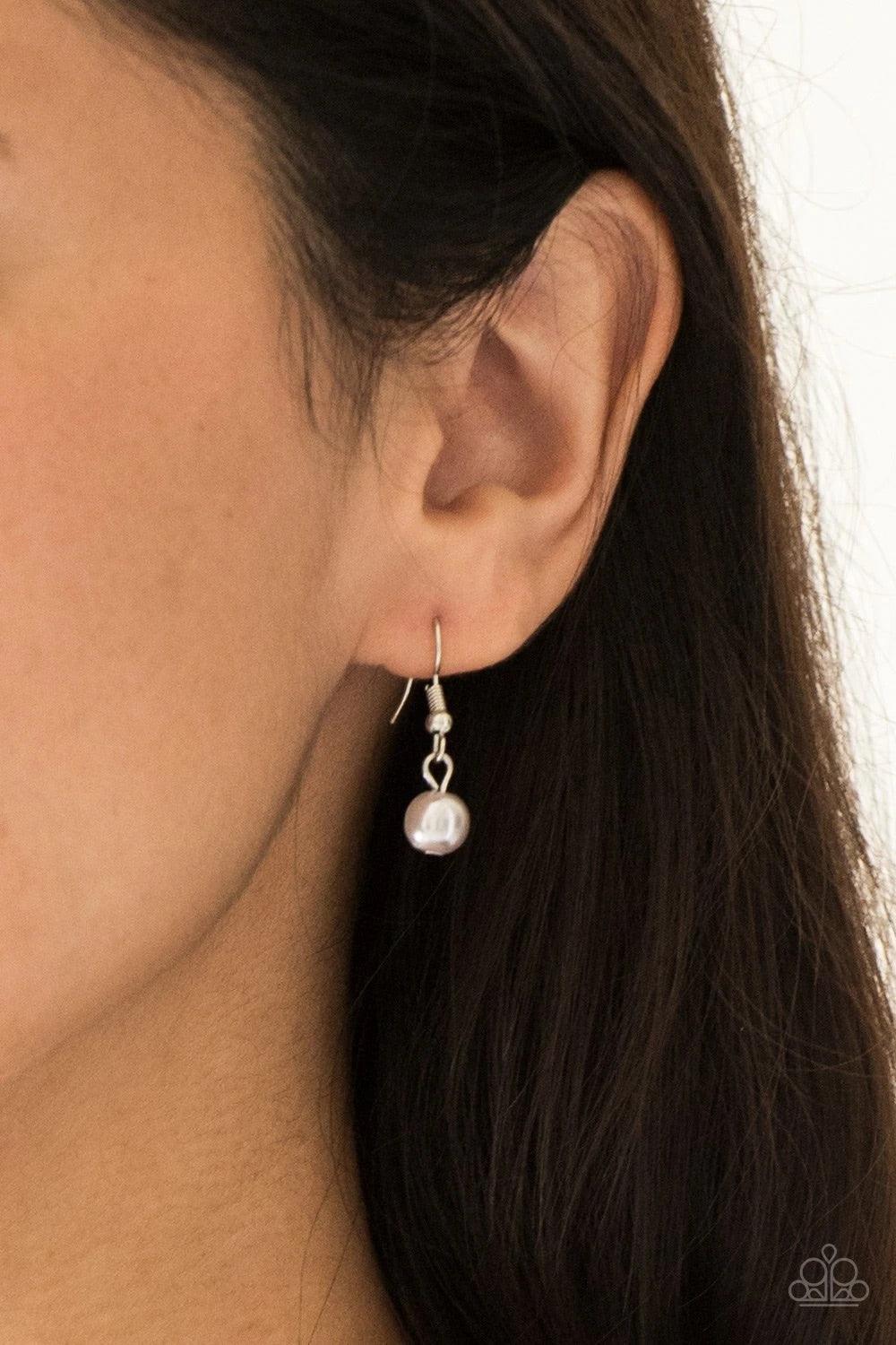 Paparazzi Accessories Coastal Cache - Silver Pearly silver beads, smoky crystal-like gems, and hammered silver discs swing from a bold silver chain, creating a refined fringe below the collar. Features an adjustable clasp closure. Sold as one individual n