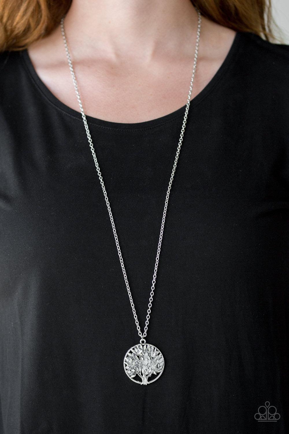 Paparazzi Accessories Naturally Nirvana - White Bits of white rock are sprinkled along a shimmery silver tree pendant, creating colorful leaves. Features an adjustable clasp closure. Jewelry
