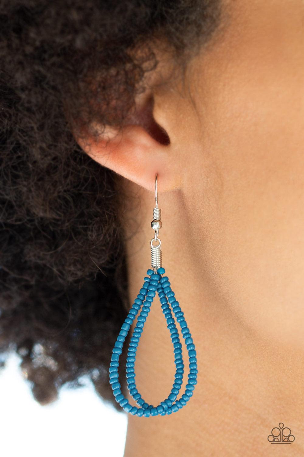 Paparazzi Accessories A Standing Ovation - Blue Countless strands of blue seed beads are twisted and knotted together to create an unforgettable statement piece. Features an adjustable clasp closure. Sold as one individual necklace. Includes one pair of m