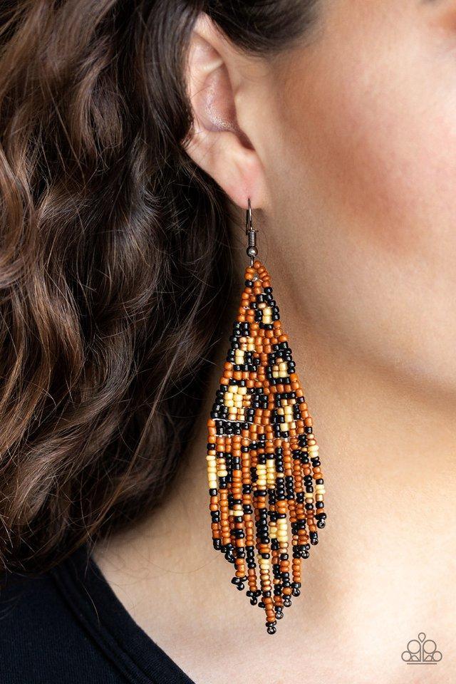 Paparazzi Accessories Bodacious Bombshell - Brown Featuring black, brown and golden seed beads, dainty beaded tassels swing from the bottom of a beaded triangular frame for a tribal inspired look. Earring attaches to a standard fishhook fitting. Sold as o