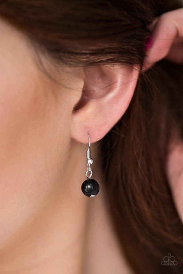 Paparazzi Accessories Paleo Princess - Black Featuring round and asymmetrical cuts, refreshing black stones trickle from the bottom of a double chain-linked chain. Faceted silver beads trickle between the stones, adding a splash of metallic shimmer to the