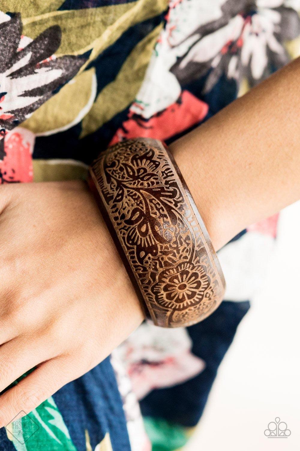Paparazzi Accessories Beach Retreat - Brown A thick wooden bangle is etched in intricate floral patterns, creating an irresistibly laid-back statement piece. Jewelry