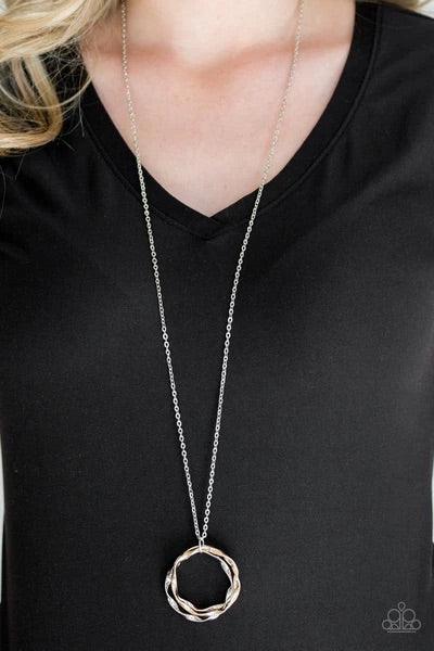Paparazzi Accessories Millennial Minimalist - Multi Twirling rose gold, gold, and silver hoops swing from the bottom of an elegantly elongated silver chain, creating a dizzying pendant. Features an adjustable clasp closure. Sold as one individual necklace