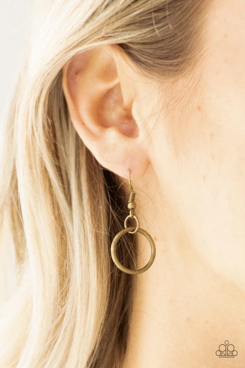 Paparazzi Accessories Warning Bells - Brass Brushed in an antiqued finish, mismatched brass beads and airy brass hoops swing from two rows of brass chains, creating an edgy fringe below the collar. Features an adjustable clasp closure. Sold as one individ