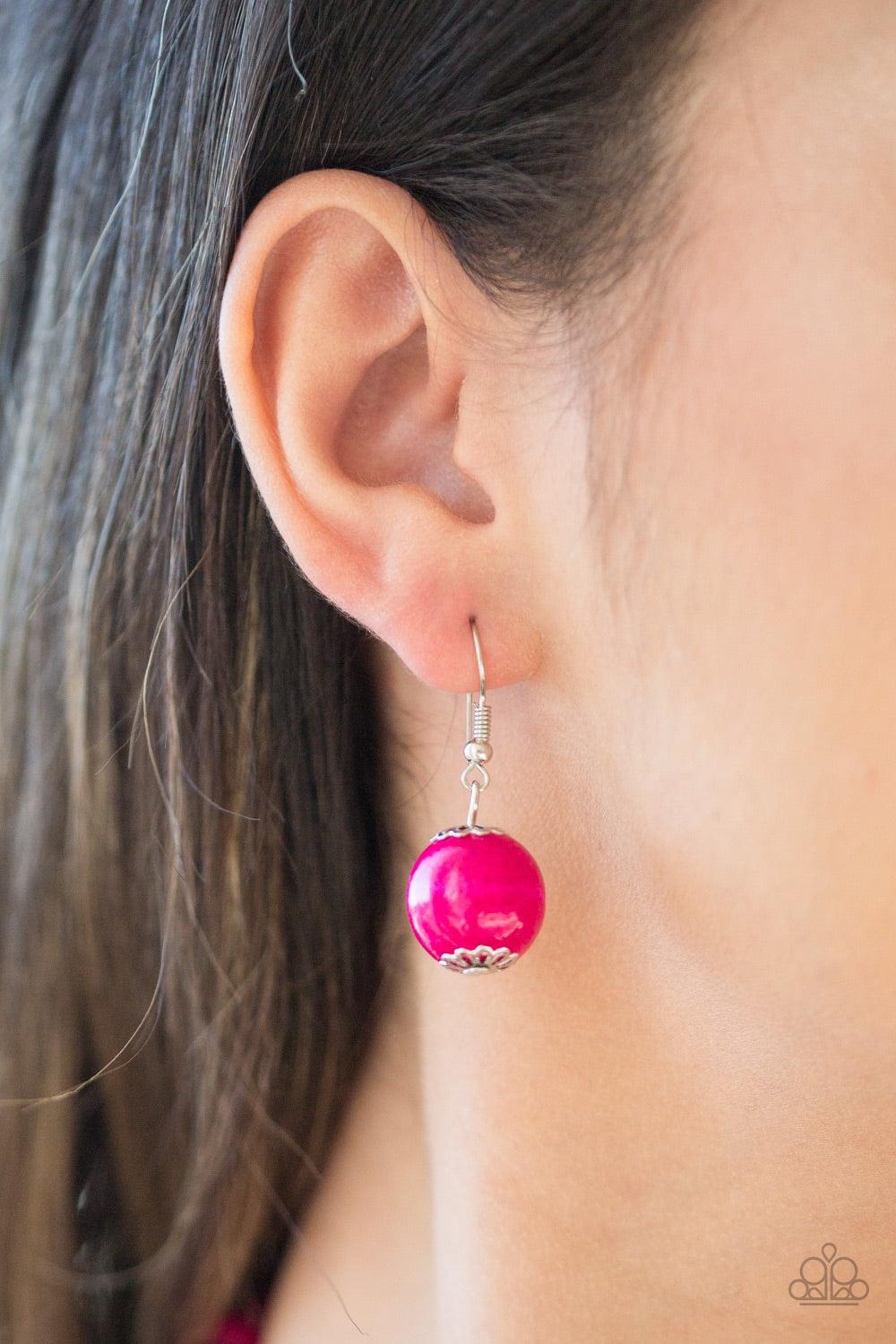 Paparazzi Accessories Tahiti Tropic - Pink Brushed in a flirty pink finish, strands of vivacious wooden beads subtly twist across the chest for a summery look. Jewelry