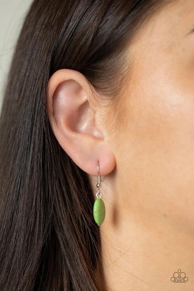 Paparazzi Accessories Meet Me At Sunset - Green A set of oversized oval green stones, encased in hammered silver frames, are linked one upon the other, calling attention to their bold mood. A fringe of silver chain sways below the set on a lengthened silv