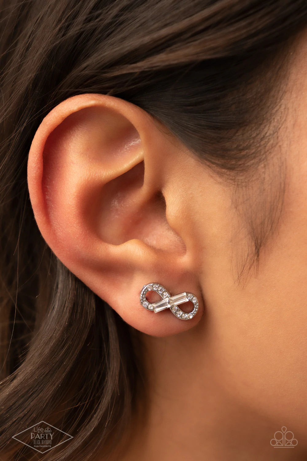 Paparazzi Accessories Turn of the Century - White Glassy emerald-cut rhinestones embellish a radiant infinity. Dainty white rhinestones are sprinkled along the swooping silver frame, adding additional sparkling accents to the romantic design. Earring atta