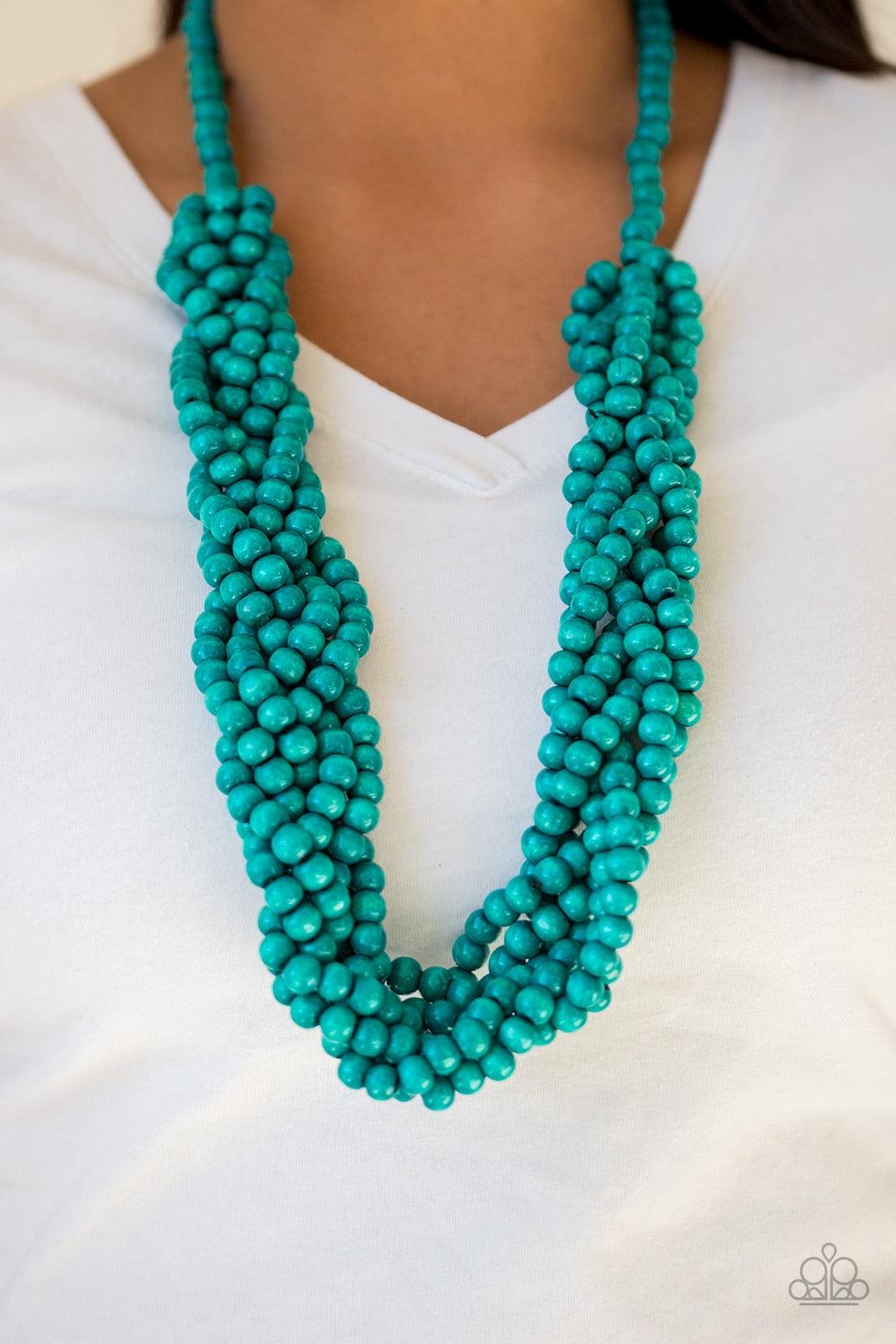 Paparazzi Accessories Tahiti Tropic - Blue Brushed in a refreshing blue finish, strands of vivacious wooden beads subtly twist across the chest for a summery look. Jewelry