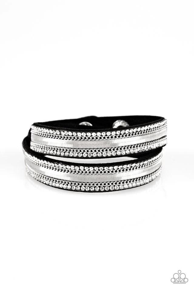 Paparazzi Accessories Rocker Rivalry - Black Rows of classic silver chain, flat silver chain, and dainty white rhinestones are encrusted along a black suede band for a sassy look. The elongated band allows for a trendy double wrap design. Features an adju
