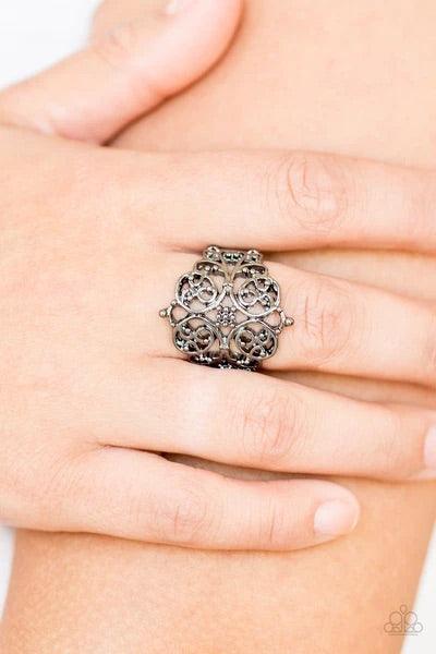 Paparazzi Accessories Victorian Valor - Black Brushed in a glistening finish, shimmery gunmetal filigree vines curl across the finger, coalescing into an airy frame for a vintage-inspired look. Features a stretchy band for a flexible fit. Sold as one indi