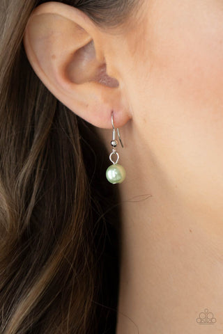Paparazzi Accessories Pearl Essence - Green Soft pastel Green Ash pearls dangle alongside dainty silver and faceted glass beads as they float gracefully below the collar on a silver chain. Features an adjustable clasp closure. Sold as one individual neckl
