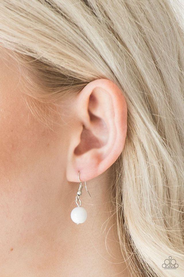 Paparazzi Accessories Very Visionary - White Polished and glassy white beads trickle along a shimmery silver chain featuring round and square frames for a seasonal look. Features an adjustable clasp closure. Sold as one individual necklace. Includes one p
