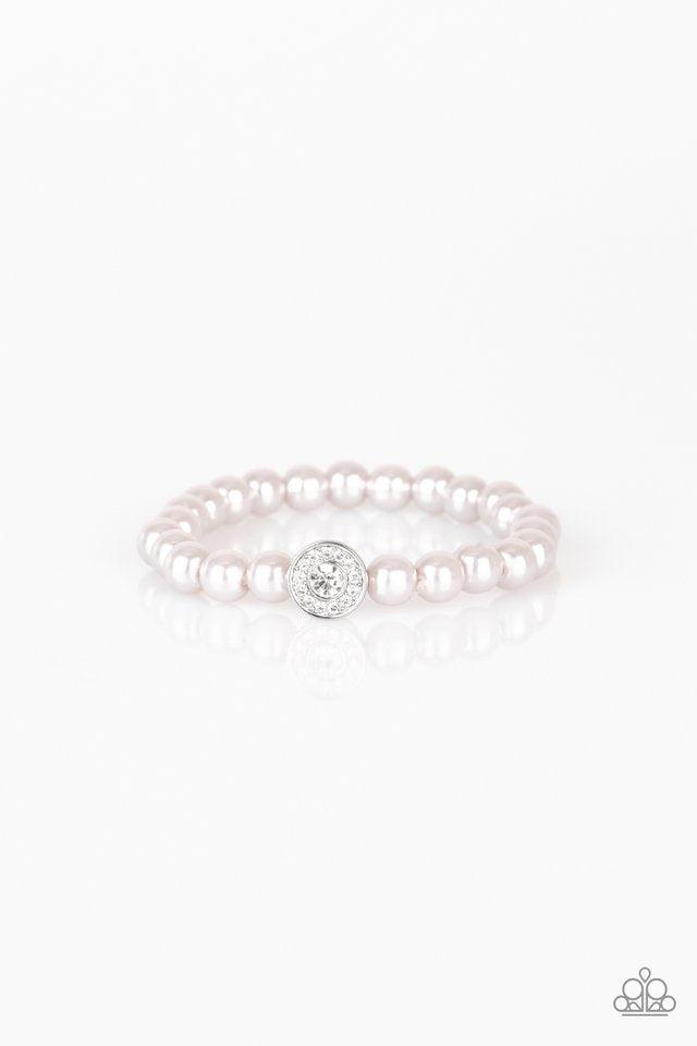 Paparazzi Accessories Follow My Lead - Silver Silver pearls and a white rhinestone encrusted silver charm are threaded along a stretchy band, creating a glamorous centerpiece atop the wrist. Sold as one individual bracelet. Jewelry
