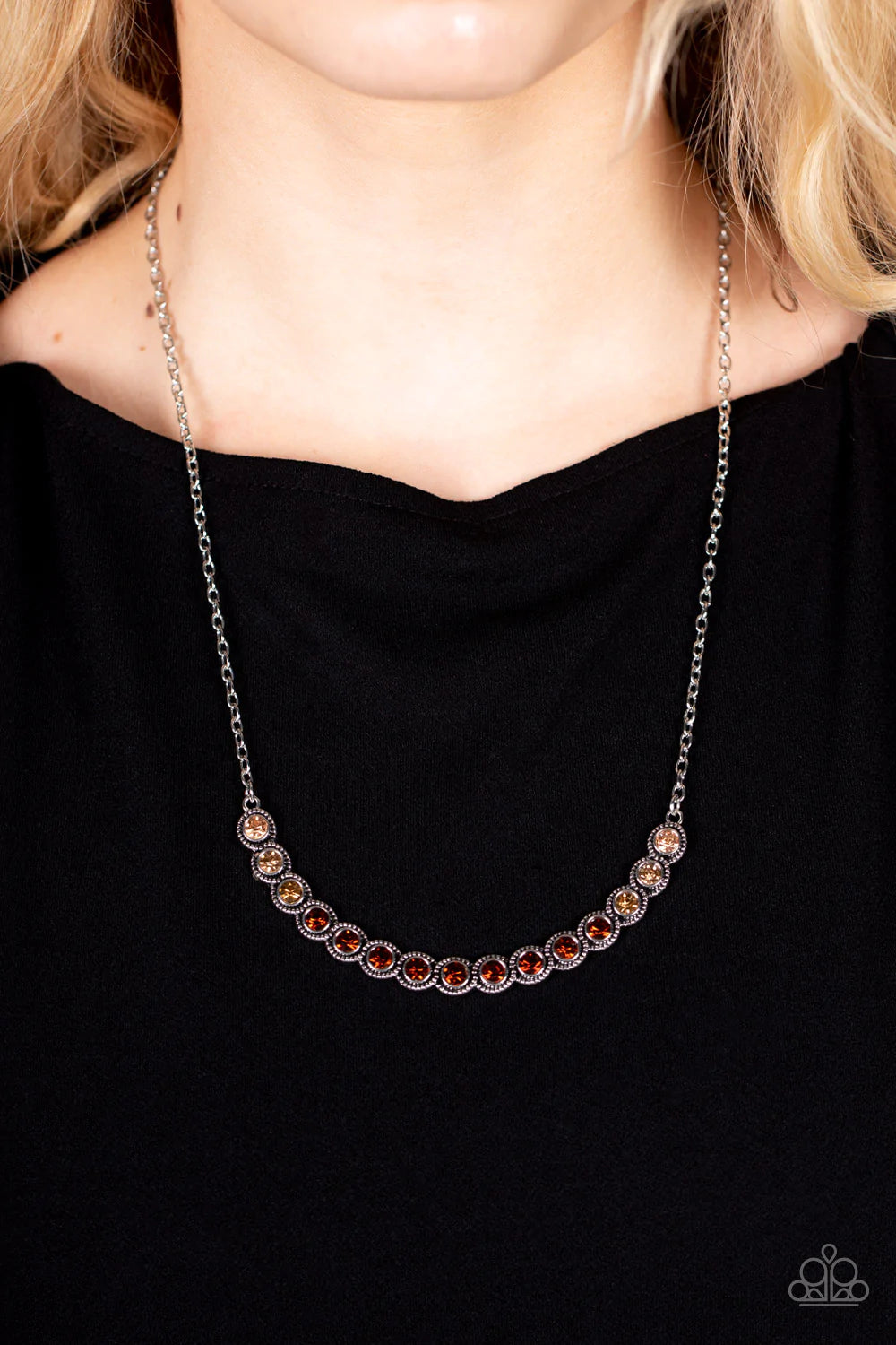 Paparazzi Accessories Throwing Shades - Brown Encased in studded silver fittings, a glittery ombré of topaz rhinestones delicately bows below the collar, creating an enchanting pop of color. Features an adjustable clasp closure. Sold as one individual nec