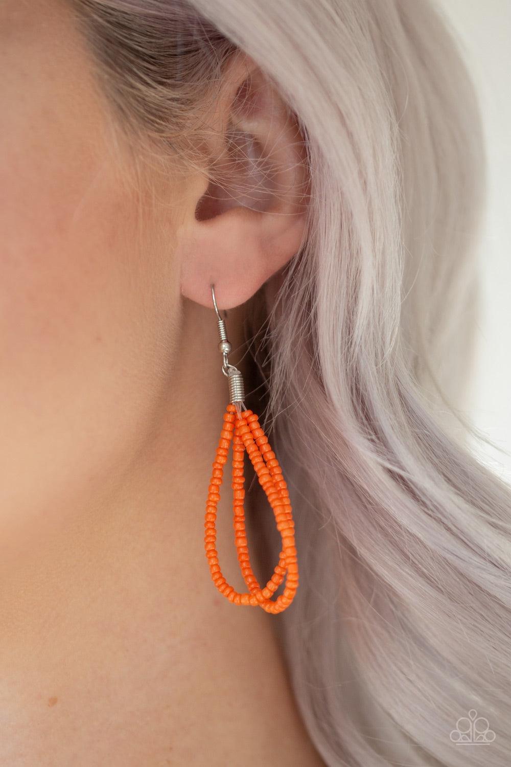 Paparazzi Accessories Peacefully Pacific - Orange Infused with two bold silver fittings, row after row of orange seed beads layer across the chest for a seasonal fashion. Features an adjustable clasp closure. Jewelry