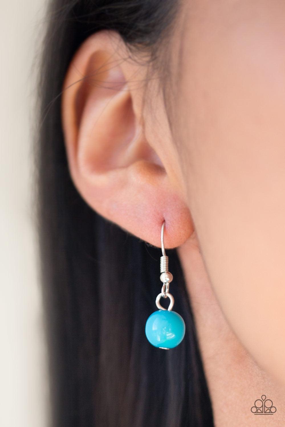 Paparazzi Accessories Daytime Drama - Blue Gradually increasing in size near the center, a collection of blue, silver, and cloudy beads join below the collar in a statement making fashion. Features an adjustable clasp closure. Jewelry