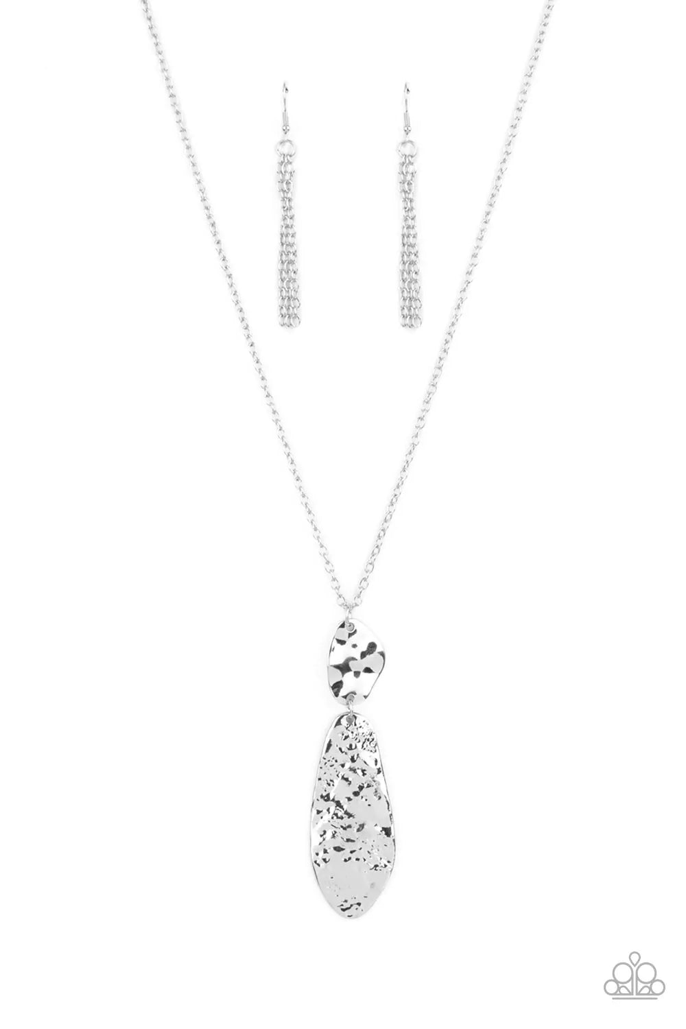 Paparazzi Accessories Artisan Abode - Silver Hammered in bold rustic finishes, asymmetrical silver plates link at the bottom of a lengthened silver chain for an artisan inspired look. Features an adjustable clasp closure. Sold as one individual necklace.