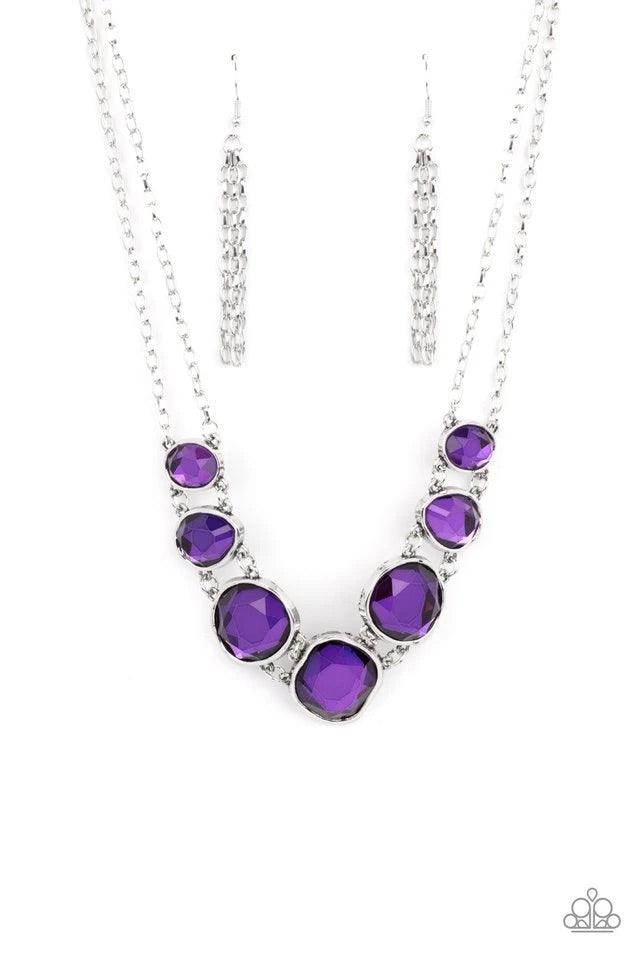 Paparazzi Accessories Absolute Admiration - Purple Encased in hammered asymmetrical silver frames, an imperfect collection of faceted purple gems are suspended from two shimmery silver chains as they double-link below the collar for a dramatic effect. Fea