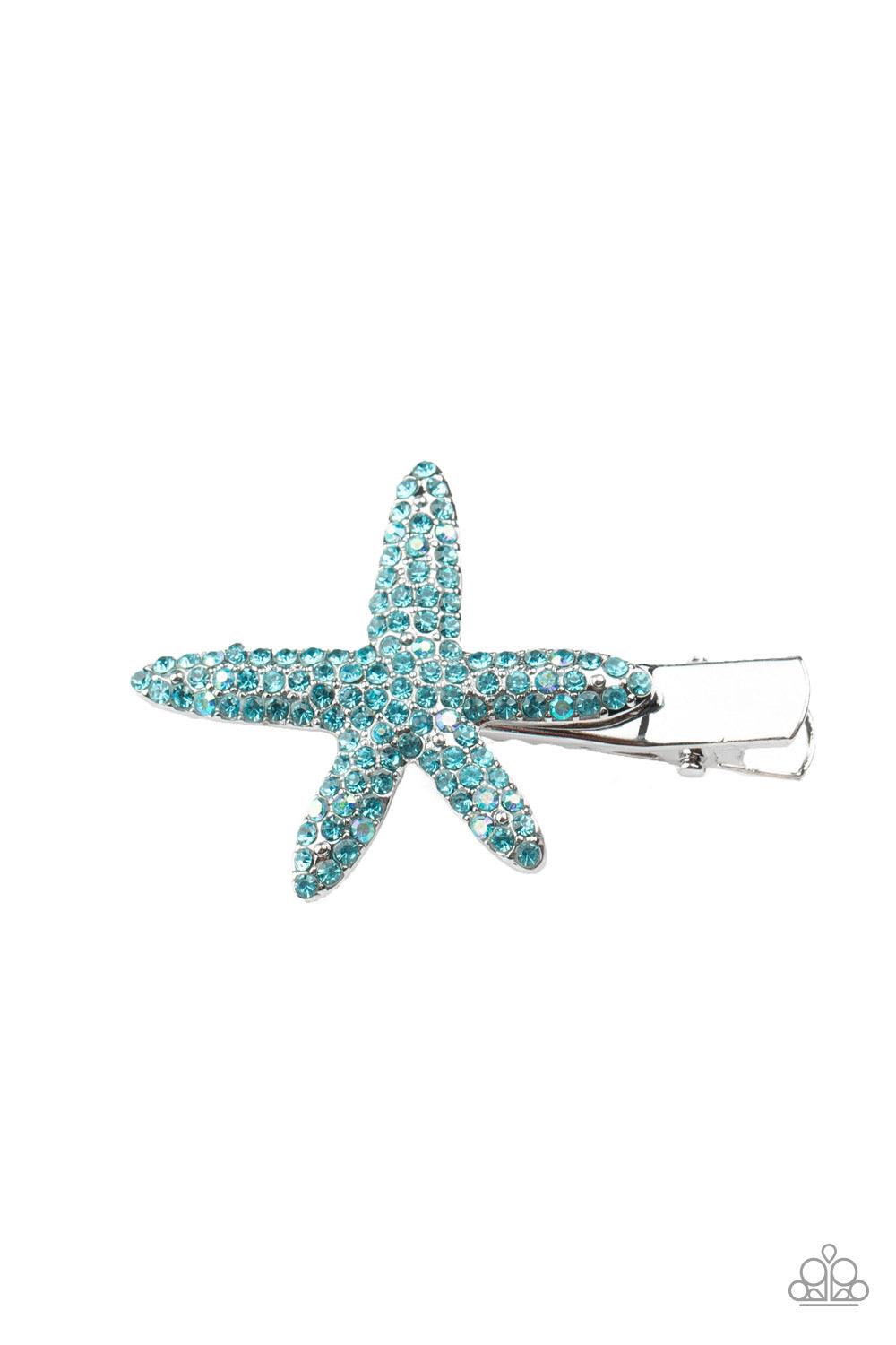 Paparazzi Accessories Was On a STARFISH ~Blue Encrusted in glittery blue rhinestones, a silver starfish delicately pulls back the hair for a beach inspired fashion. Features a standard hair clip. Sold as one individual hair clip.