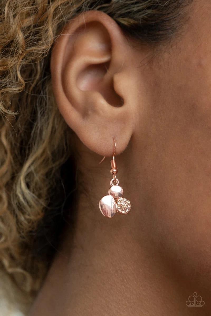 Paparazzi Accessories A Hard LUXE Story - Copper Featuring imperfect oval shapes, a series of delicately scratched and peach rhinestone encrusted shiny copper frames connect into a clustered pendant below the collar for a refined flair. Features an adjust