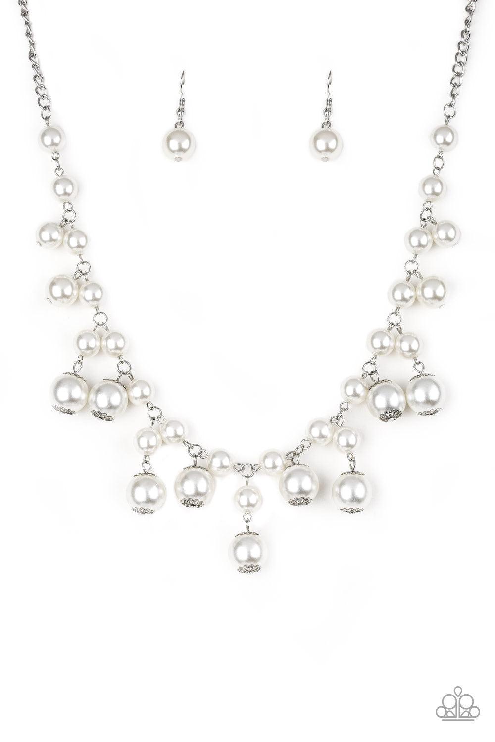 Paparazzi Accessories Soon To Be Mrs. - White Varying in size, bubbly white pearls swing from the bottom of a classic strand of pearls, creating a refined fringe below the collar. Features an adjustable clasp closure. Jewelry