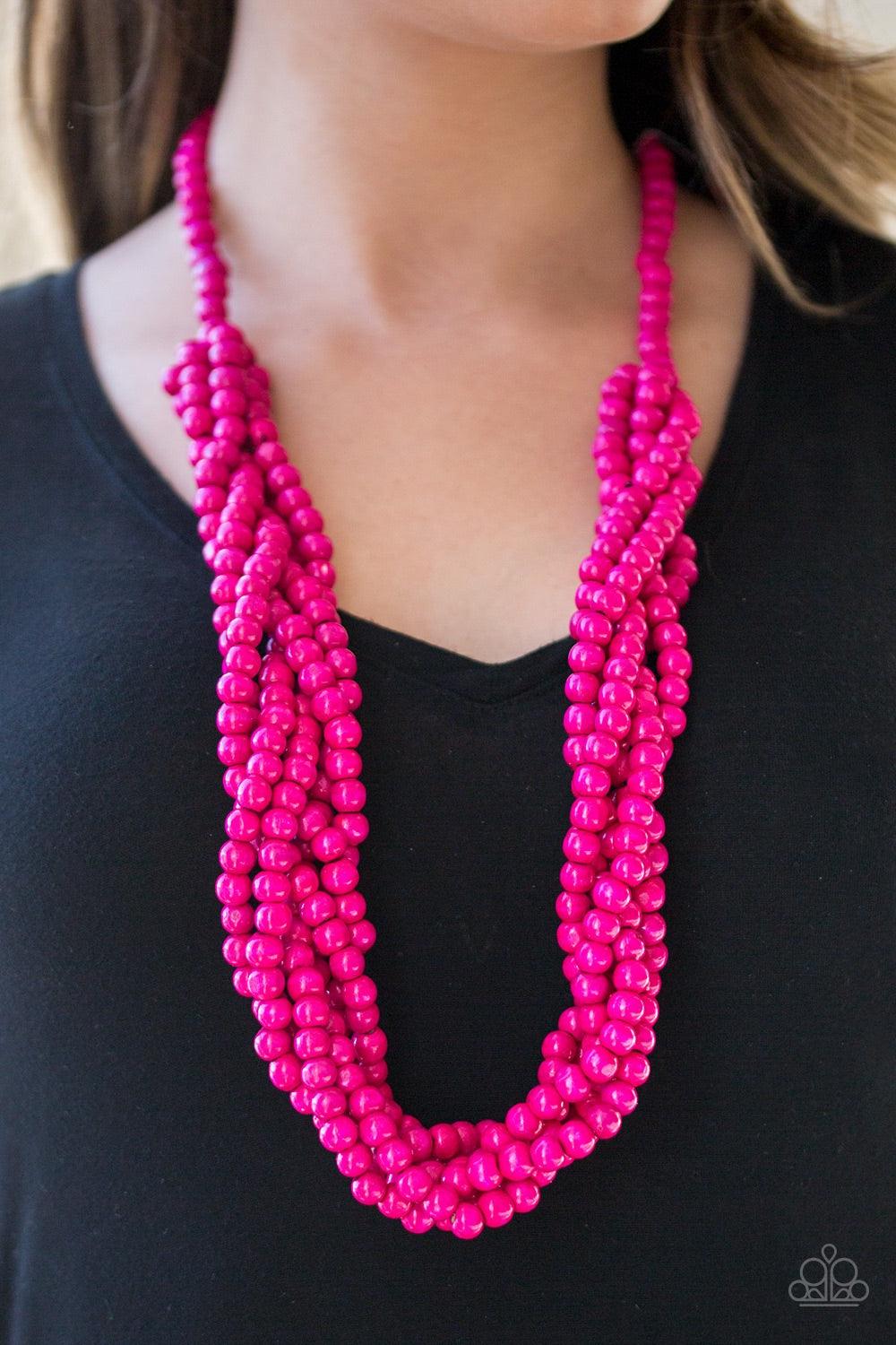 Paparazzi Accessories Tahiti Tropic - Pink Brushed in a flirty pink finish, strands of vivacious wooden beads subtly twist across the chest for a summery look. Jewelry