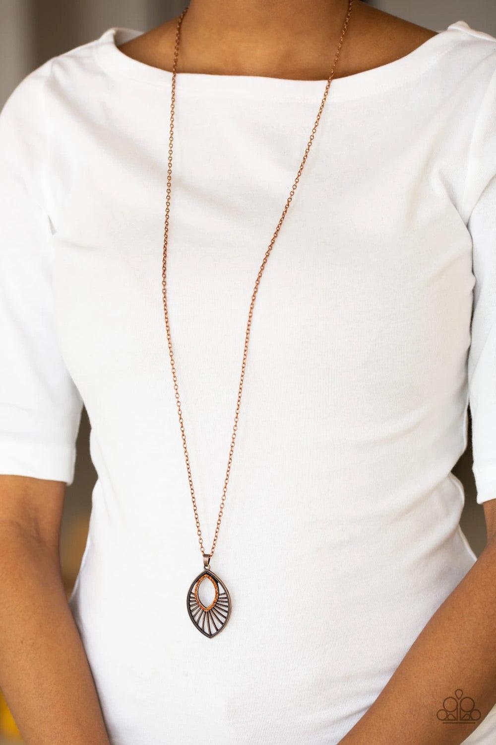 Paparazzi Accessories Court Couture - Copper Radiating with studded copper bars, a glistening marquise shaped frame swings from the bottom of an elongated gunmetal chain. Glittery rhinestones adorn the frame, adding a refined flair to the regal pendant. F