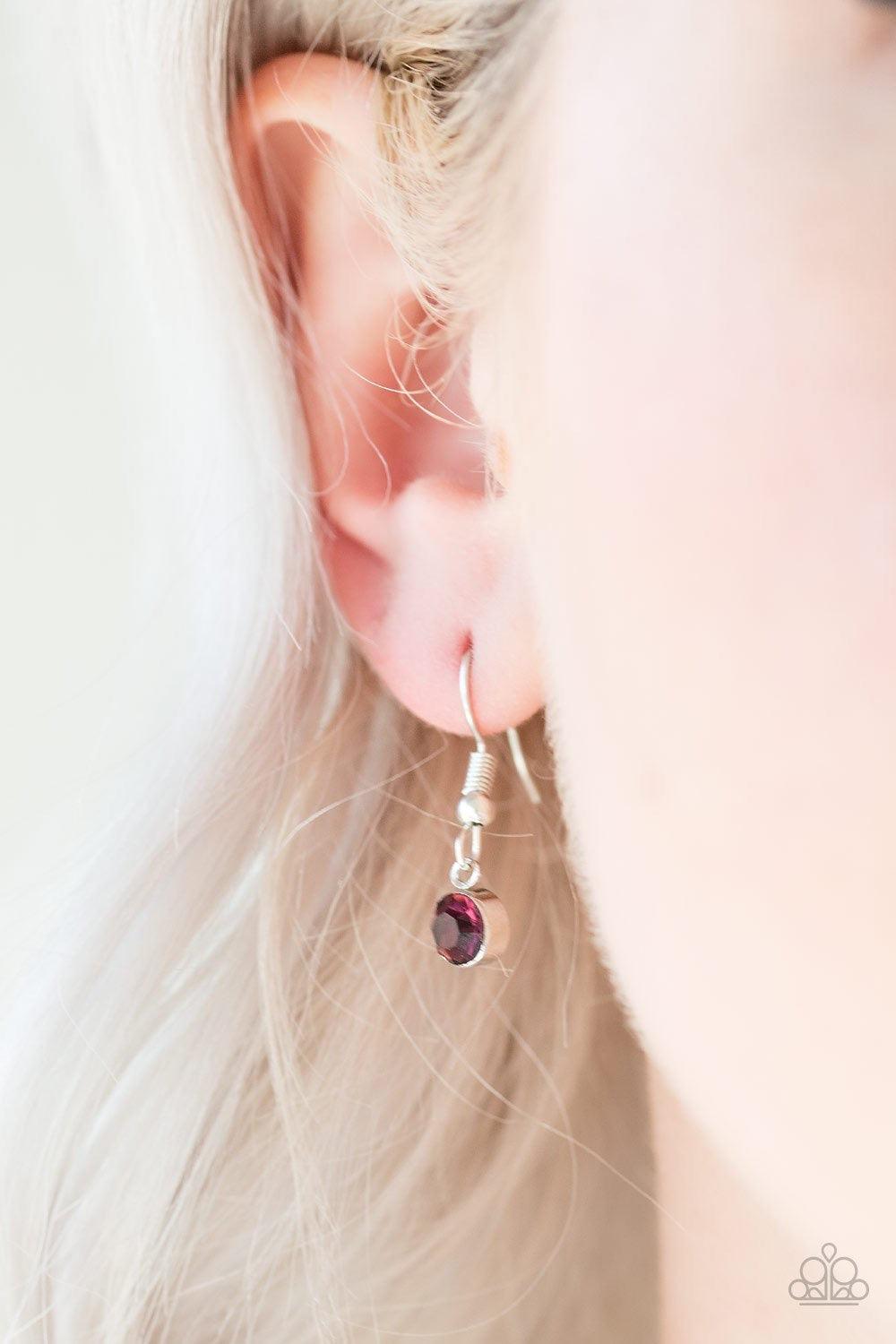 Paparazzi Accessories I Am Queen - Purple A dramatic teardrop pendant swings from the bottom of an elongated silver chain, elegantly slimming the torso. Glittery purple rhinestones are sprinkled along the pendant as silver filigree dances across the cente
