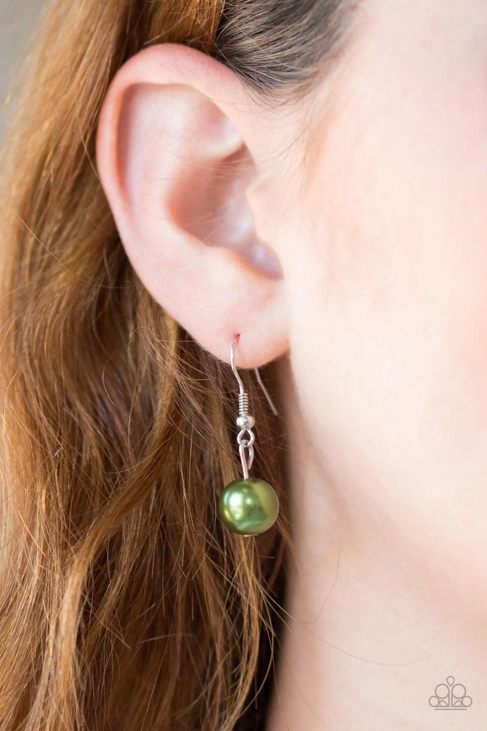 Paparazzi Accessories Uptown Talker - Green Varying in size, pearly green and oversized silver beads give way to sections of bold silver chain. Layers of silver chains drape across the bottom of the design for a flawless finish. Features an adjustable cla