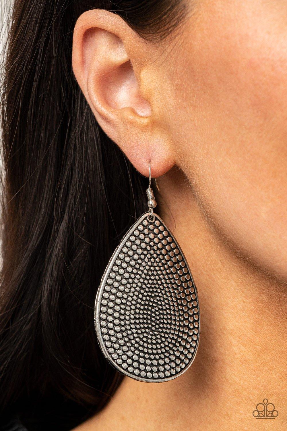 Paparazzi Accessories Artisan Adornment - Silver Antiqued silver studs gradually increase in size as they radiate outwards across the front of an oversized silver teardrop. Earring attaches to a standard fishhook fitting. Sold as one pair of earrings. Jew