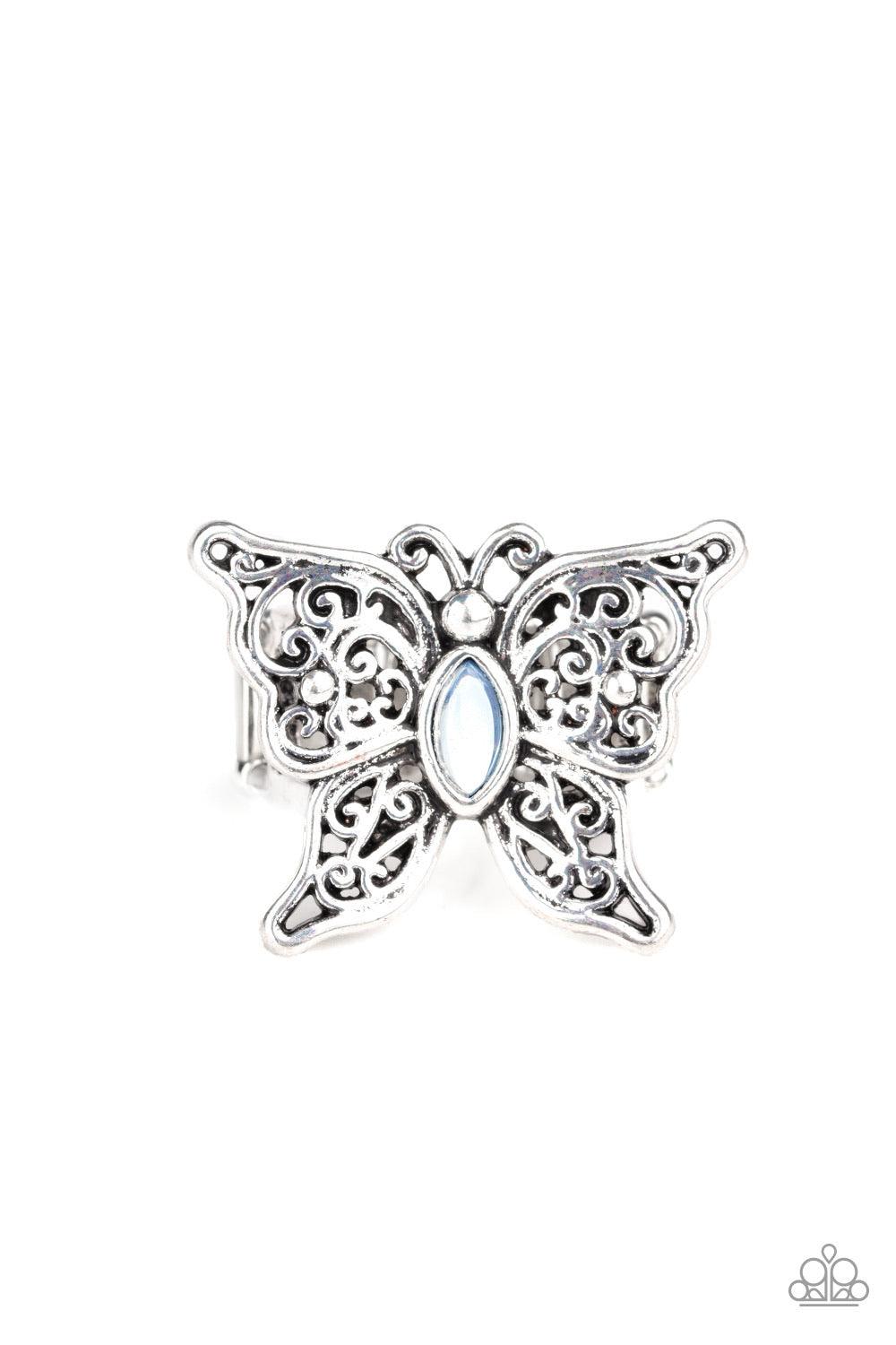 Paparazzi Accessories Flutter Flavor - Blue Lacy silver wings bloom from an opalescent blue cat's eye center, coalescing into a whimsical butterfly atop the finger. Features a stretchy band for a flexible fit. Sold as one individual ring. Jewelry