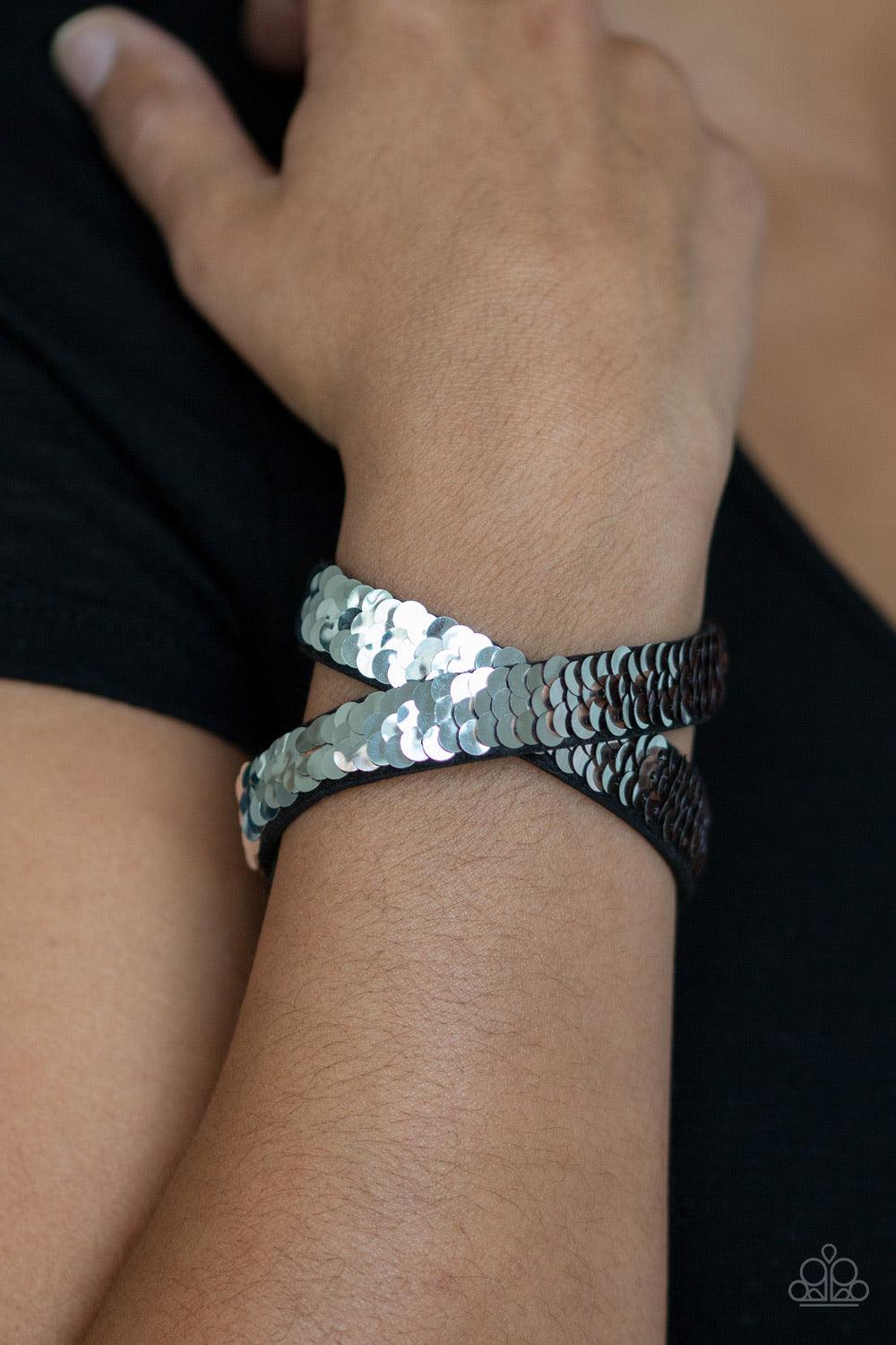 Paparazzi Accessories Under the SEQUINS - Rose Gold Row after row of shimmery sequins are stitched across the front of a lengthened black suede band. The elongated band allows for a trendy double wrap design. Bracelet features reversible sequins that chan