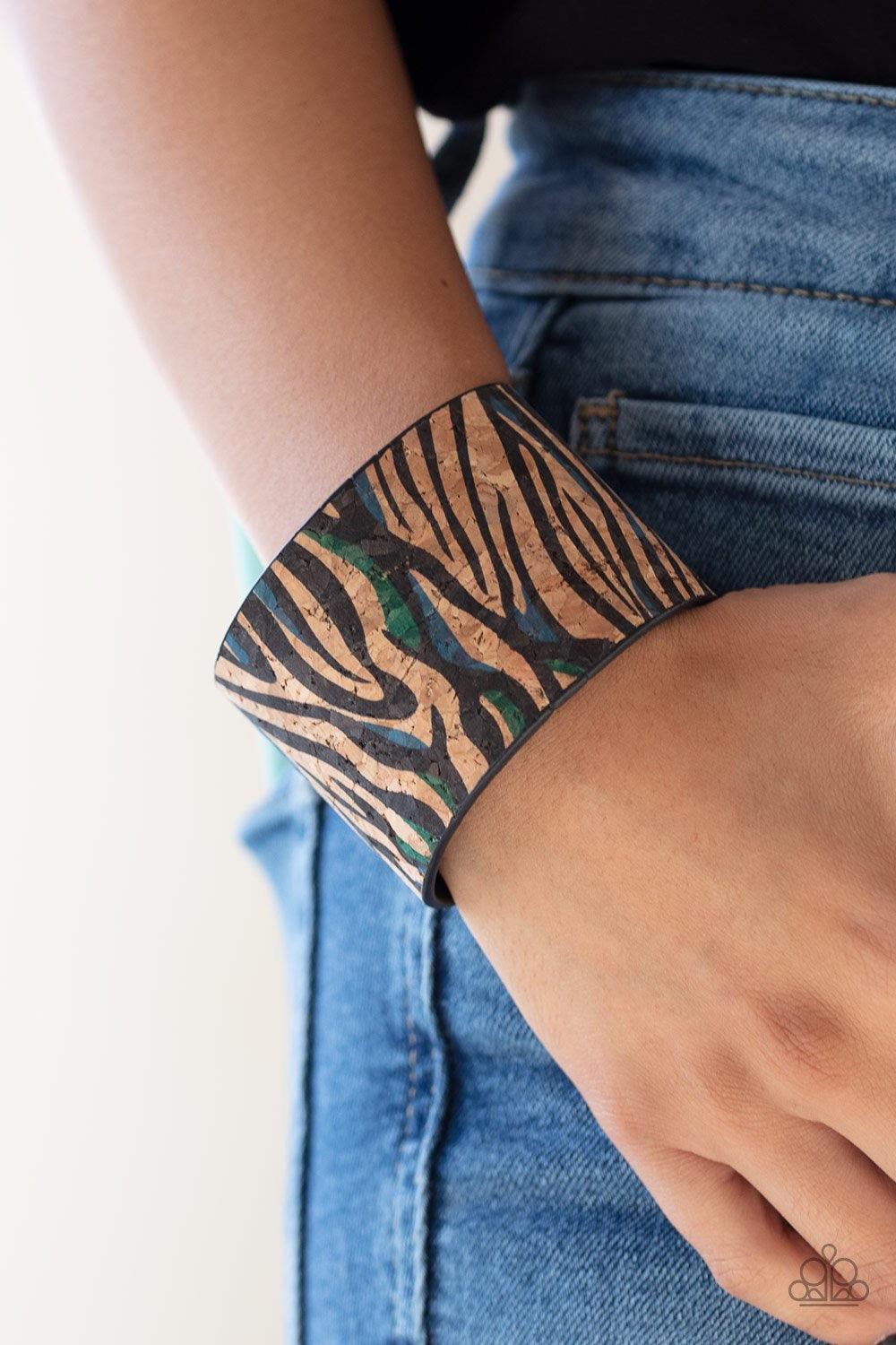 Paparazzi Accessories Show Your True Stripes - Blue Black, blue, and green zebra stripes are printed across the front of a cork-like cuff for an adventurous look. Jewelry