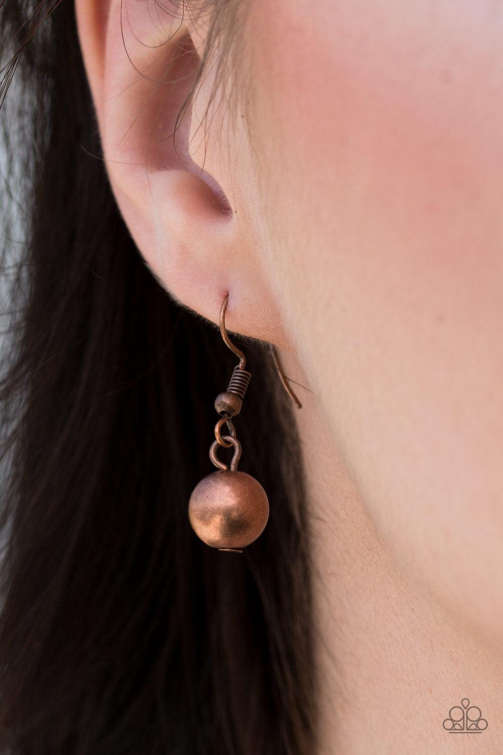Paparazzi Accessories Cast Away Treasure ~Multi Varying in shape and shimmer, a mishmash of copper, gold and gunmetal chains layer below the collar. Infused with classic gold, copper and gunmetal beads, textured copper discs swing from the bottom of the l