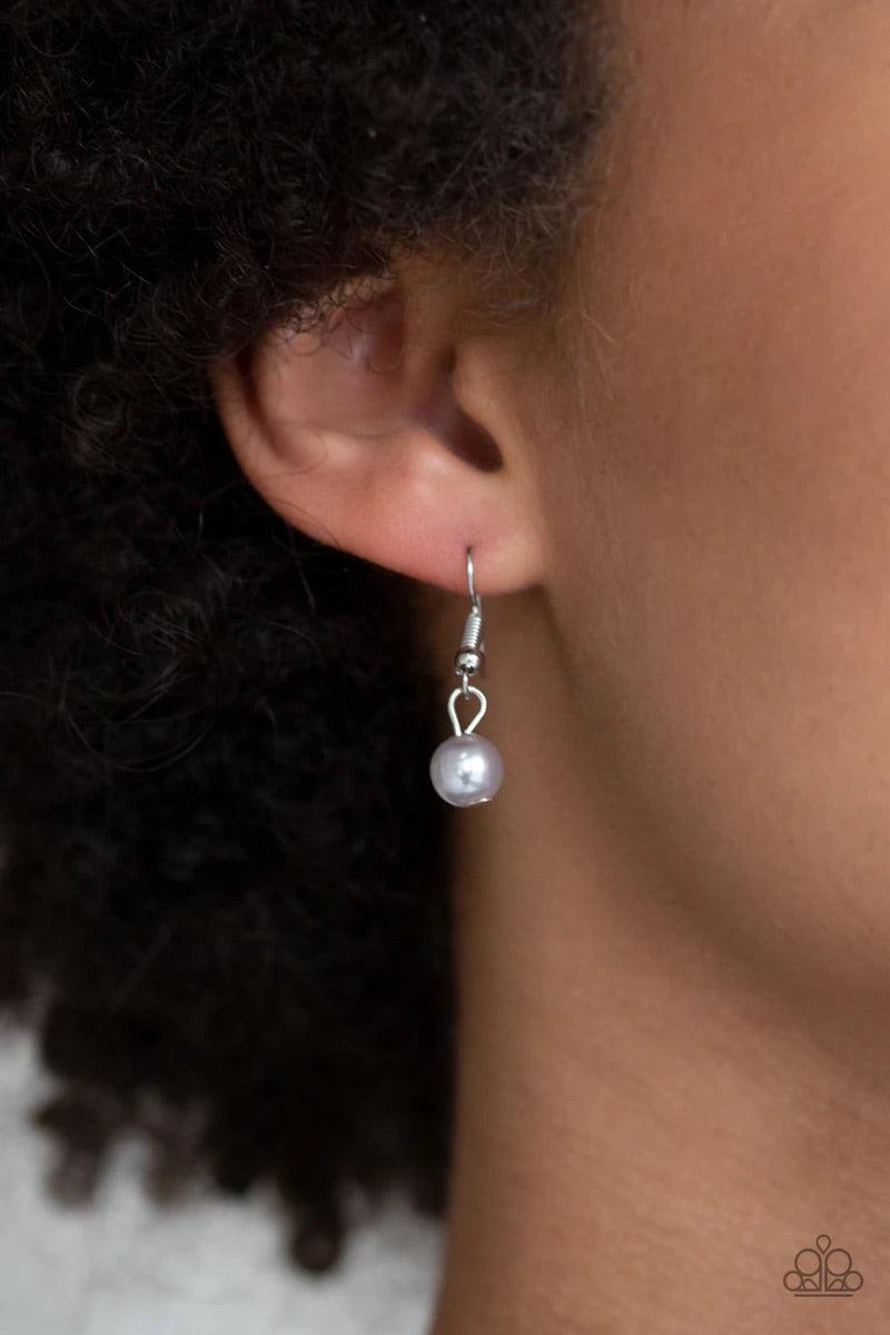 Paparazzi Accessories Pageant Princess - Silver A collection of glistening silver hoops, smoky beads, and pearly silver beads trickle along a shimmery silver chain for a refined look. Features an adjustable clasp closure. Sold as one individual necklace.