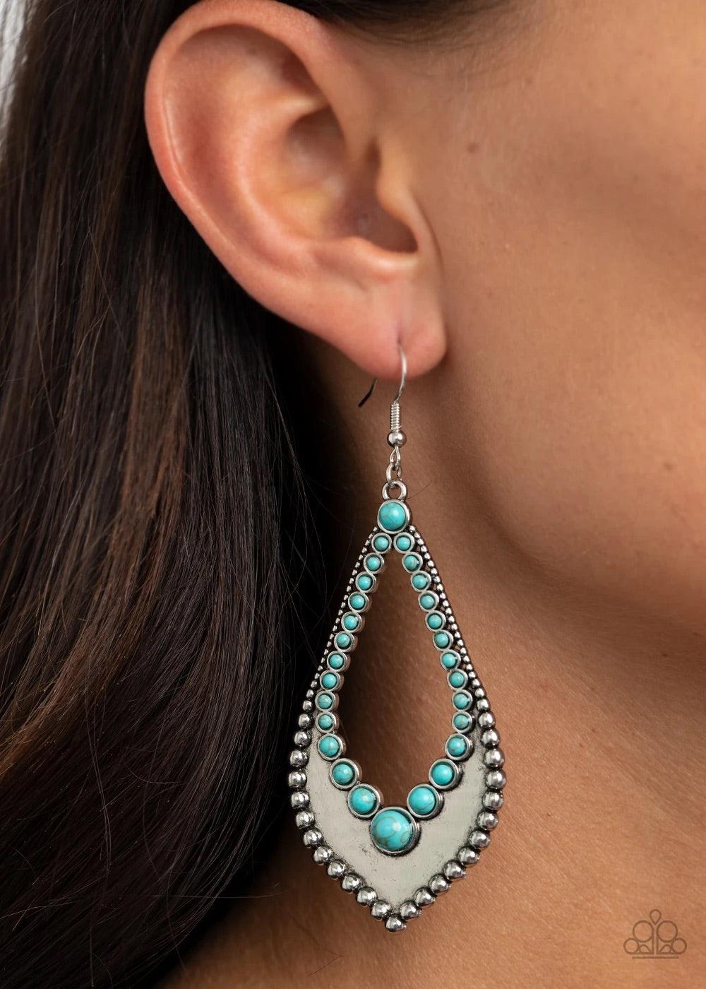 Paparazzi Accessories Essential Minerals - Blue Dainty turquoise stones dot the center of an airy silver teardrop frame. Gradually increasing in size, antiqued studs outline the frame's edge for a rustic flair. Earring attaches to a standard fishhook fitt