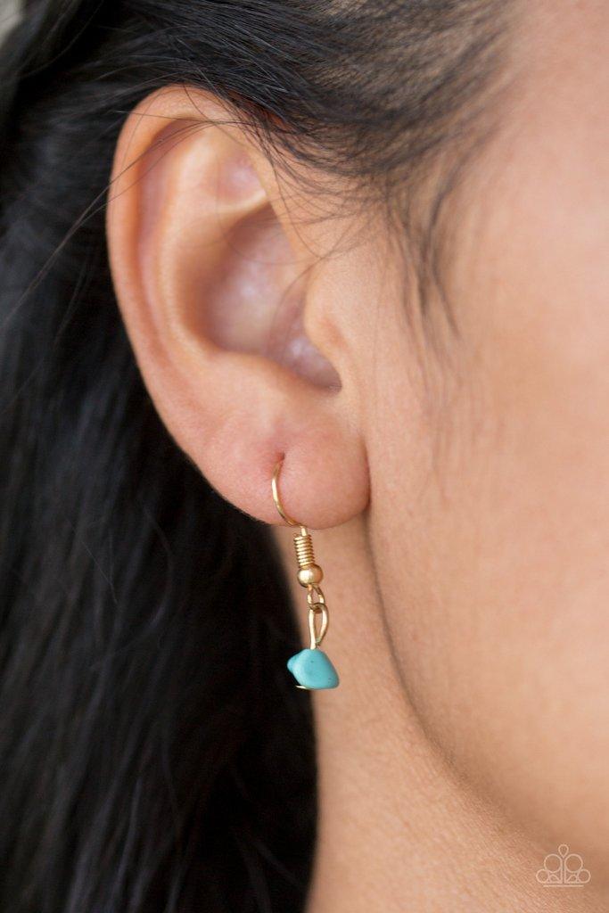 Paparazzi Accessories Back To Nature - Blue Attached to a dainty gold chain, bits of refreshing turquoise rock are threaded along an invisible wire below the collar for a seasonal look. Features an adjustable clasp closure. Sold as one individual necklace