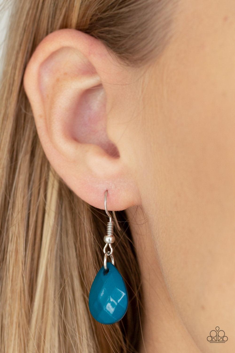 Paparazzi Accessories Life of the FIESTA - Blue Two strands of silver chain are decorated in a flirtatious fringe of faceted blue teardrops. Glittery beveled silver teardrops are sprinkled between the blue beading, adding hints of shimmer to the vibrant d