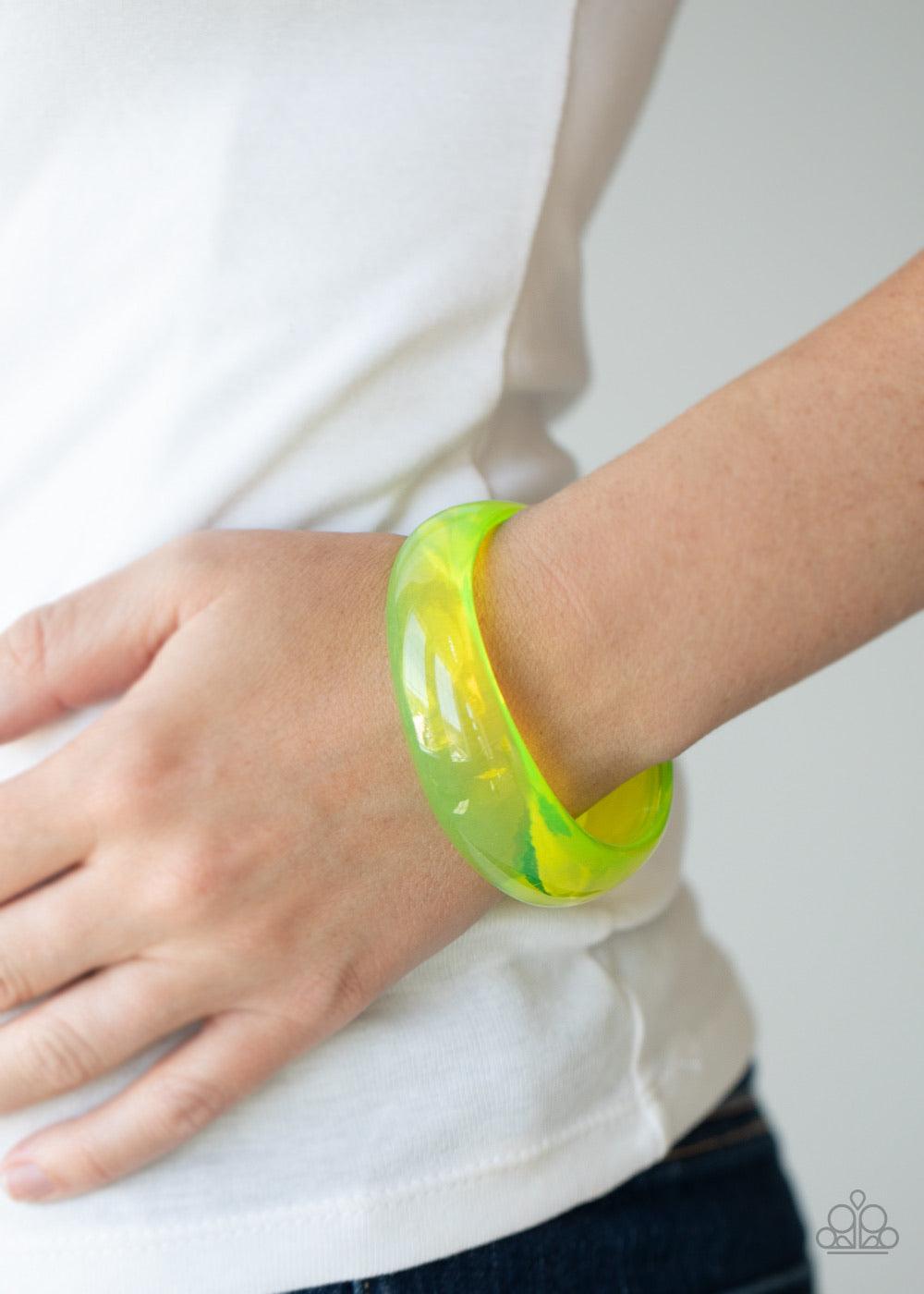 Paparazzi Accessories Major Material Girl - Yellow A neon yellow acrylic bangle slides along the wrist for a colorfully retro flair. The shiny bangle gradually widens at the top for a fabulous finish. Sold as one individual bracelet. Jewelry
