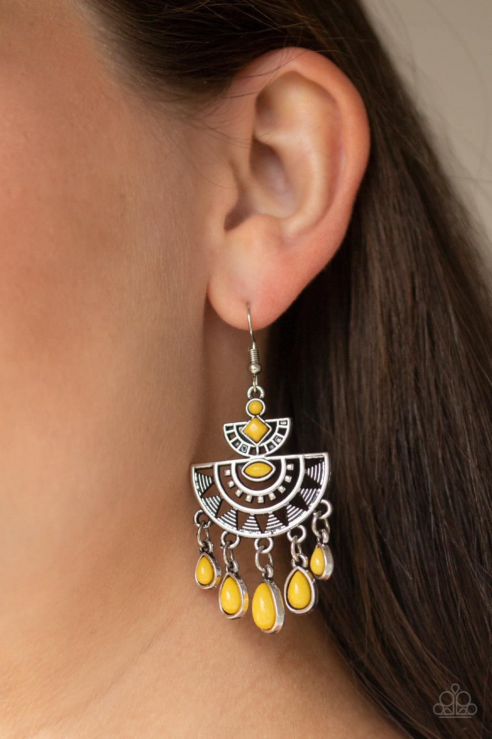Paparazzi Accessories SOL Searching - Yellow Radiating with sunburst patterns, a yellow beaded silver frame gives way to a matching yellow teardrop fringe for a seasonal flair. Earring attaches to a standard fishhook fitting. Jewelry