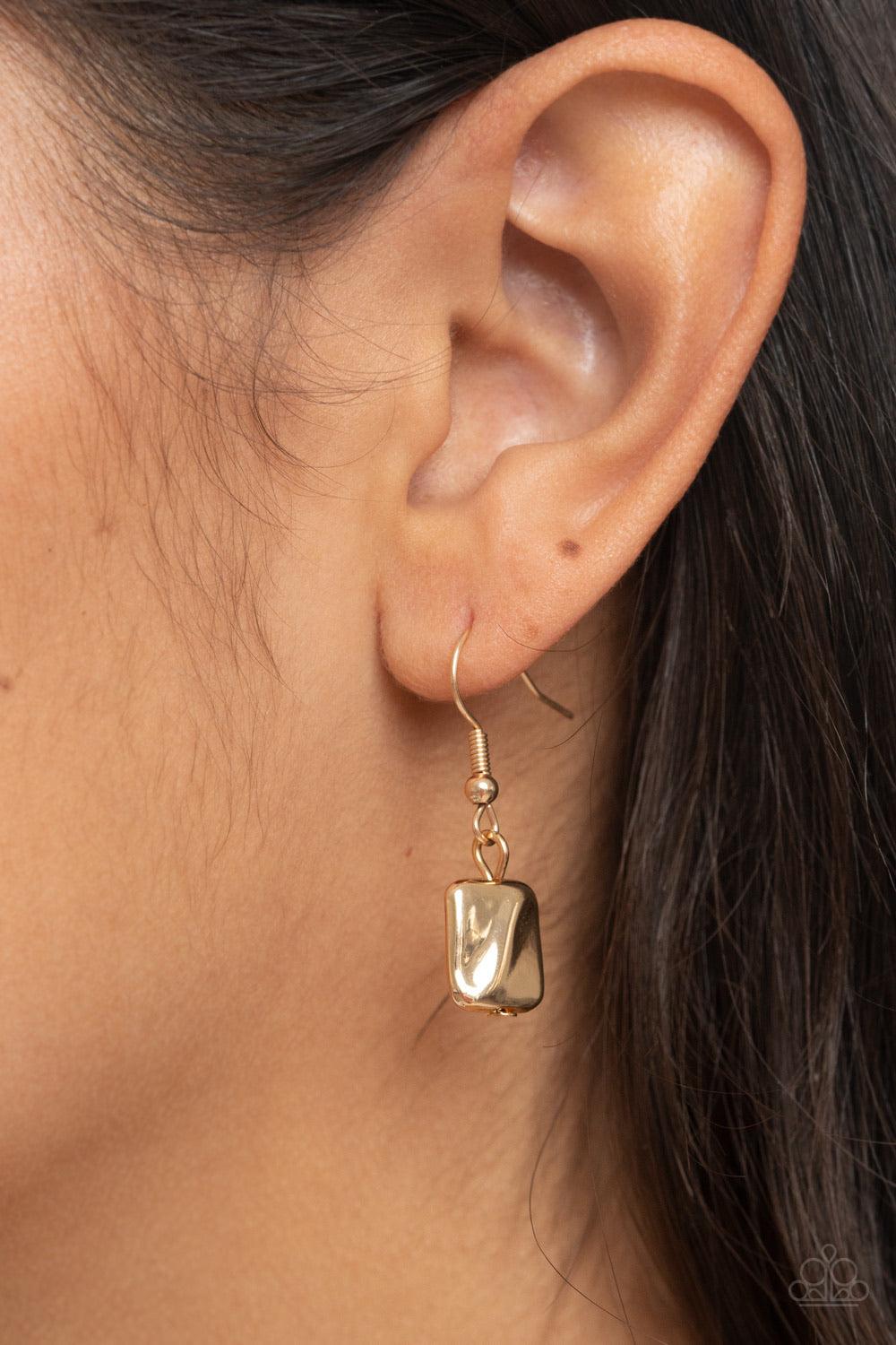 Paparazzi Accessories Downtown Reflections - Gold Featuring a decorative surface, dainty gold, gunmetal, and silver rectangular accents are fitted in place along three sleek gold chains, creating refined layers below the collar. Features an adjustable cla