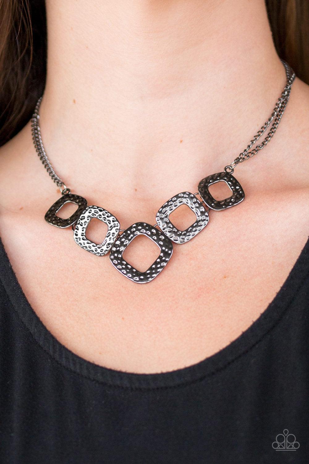 Paparazzi Accessories Wild Catch - Black Delicately hammered in shimmery textures, asymmetrical square gunmetal frames link below the collar in a bold artisanal fashion. Features an adjustable clasp closure. Sold as one individual necklace. Includes one p