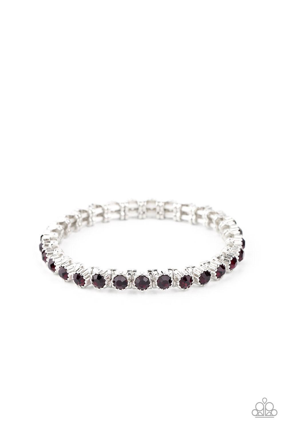 Paparazzi Accessories Starry Social - Purple Featuring shiny silver studded fittings, glittery purple rhinestones glide along stretchy bands around the wrist, creating a glamorous statement piece. Sold as one individual bracelet. Jewelry