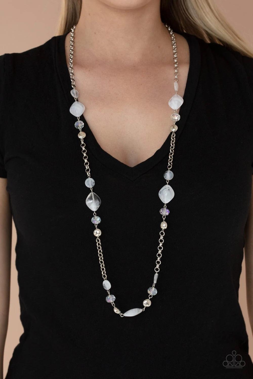 Paparazzi Accessories Light-Scattering Luminosity - White A shimmery collection of cloudy glassy-like beads, faceted metallic-flecked crystal-like beads and flat silver beads connect along sections of silver chains, creating a whimsical display across the