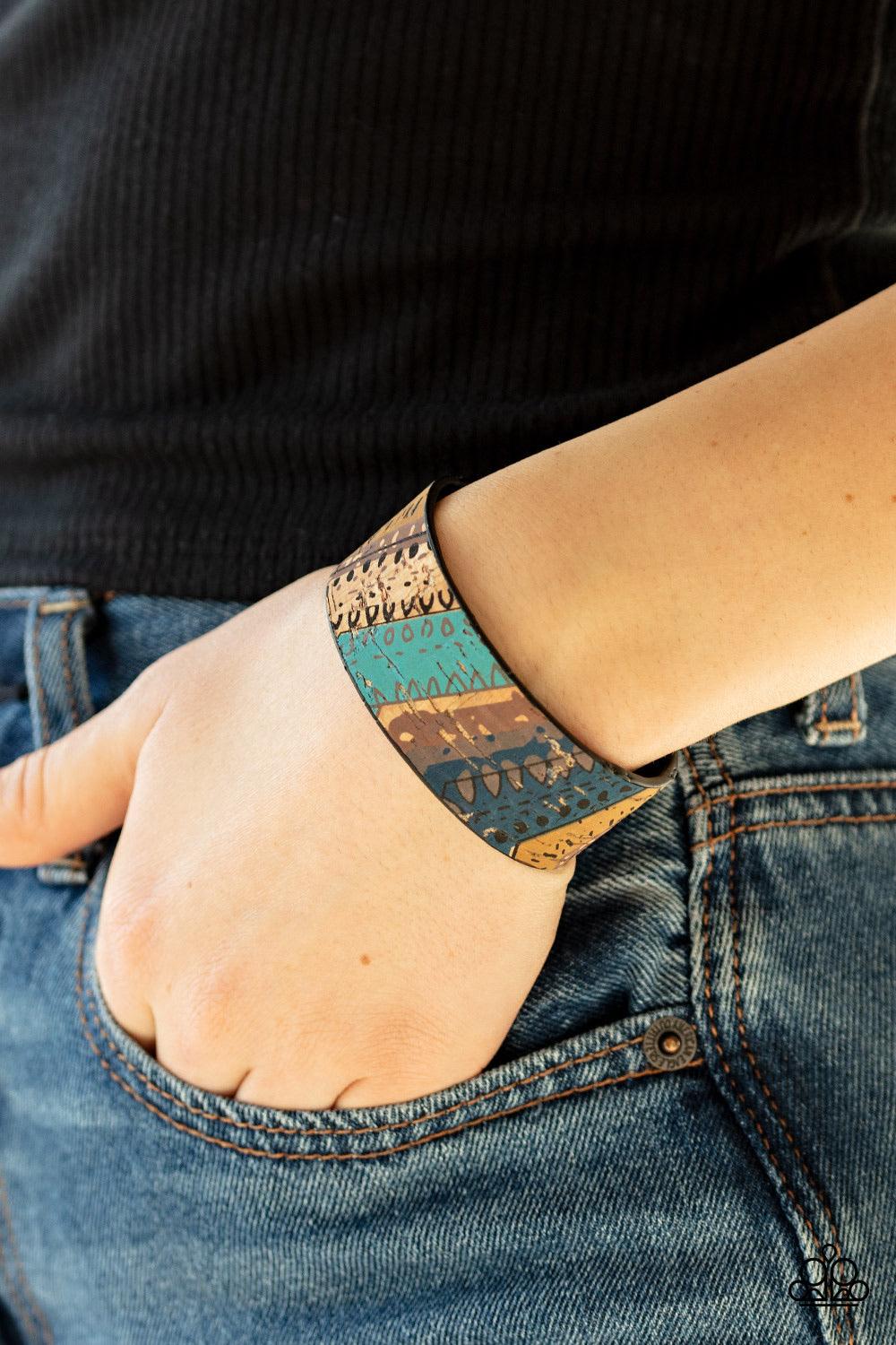 Paparazzi Accessories Came Uncorked - Blue Featuring refreshing blue accents, patches of cork-like textures coalesce across the front of a cuff for a tribal inspired look. Jewelry