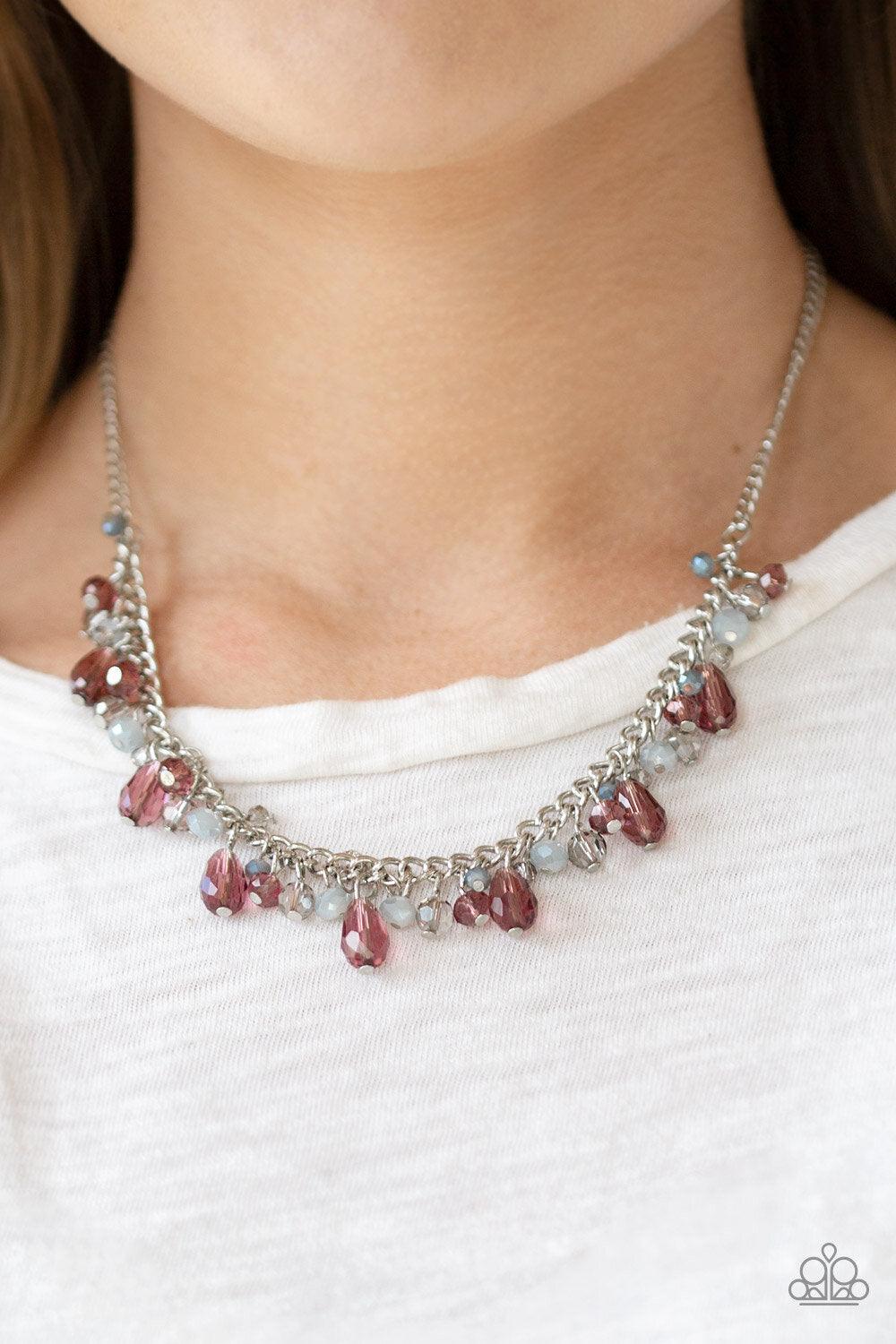 Paparazzi Accessories Courageously Catwalk - Purple Featuring crystal-like and metallic opaque finishes, mismatched purple and gray beading swings from a shimmery silver chain, creating a glamorous fringe below the collar. Features an adjustable clasp clo