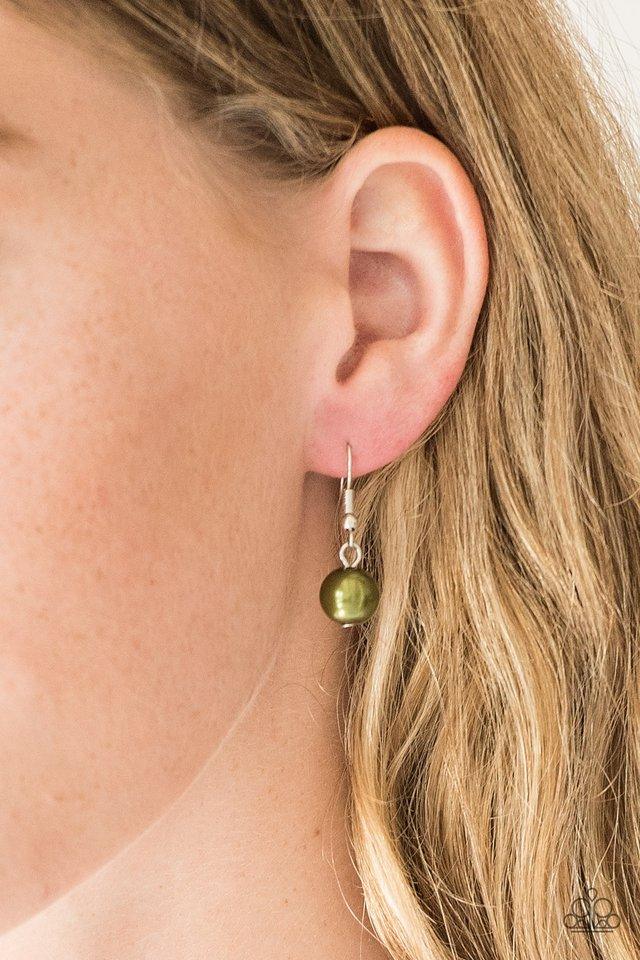Paparazzi Accessories Belle of the BALLROOM - Green A dramatic pearly green bead swings from the bottom of an elegantly elongated silver chain. Featuring a hammered fitting, a silver tassel streams from the bottom of the colorful pendant for a whimsical f