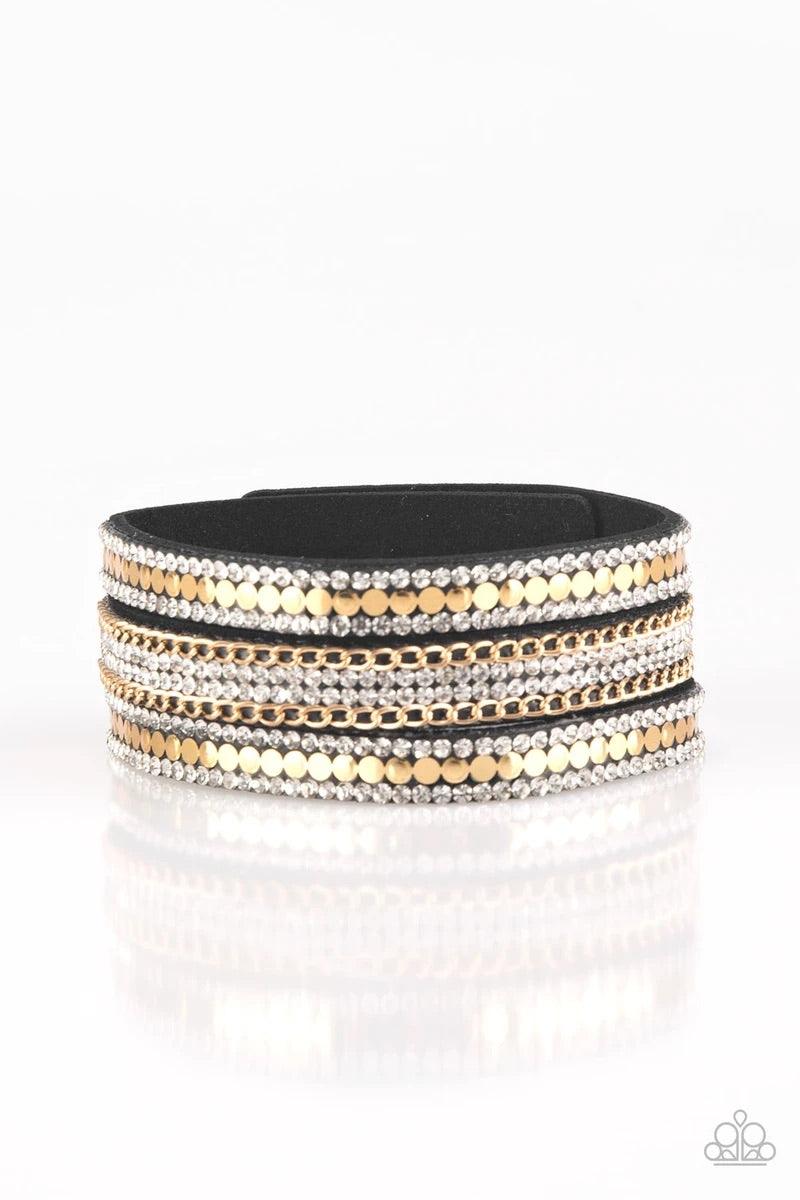 Paparazzi Accessories Fashion Fanatic - Gold Rows of flat gold discs, glassy white rhinestones, and shimmery gold chains are encrusted along black suede bands for a sassy look. Features an adjustable snap closure. Sold as one individual bracelet. Jewelry