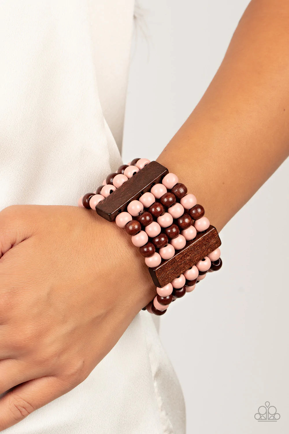 Paparazzi Accessories Island Soul - Pink Colorful layers of brown and Pale Rosette wooden beads are threaded along stretchy bands between brown wooden bars creating stacks of subtle bliss around the wrist. Sold as one individual bracelet. Jewelry